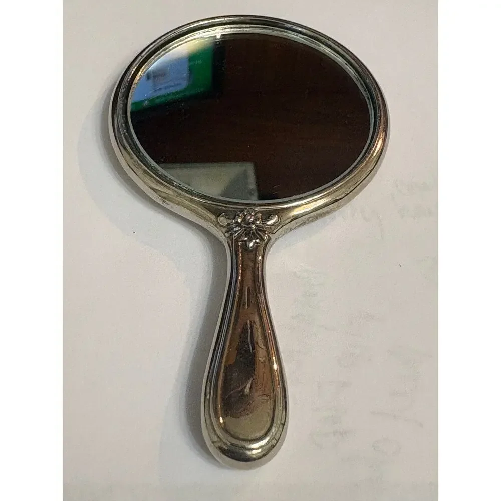Sterling Antique Handheld Beveled Floral Design